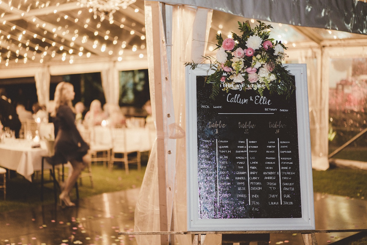 clear marquee - fairy lights - seating chart