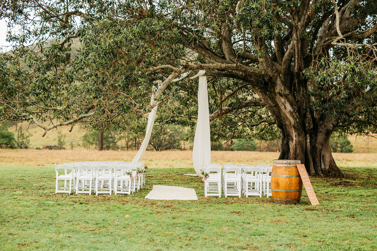 wedding-ceremony-white-chairs
