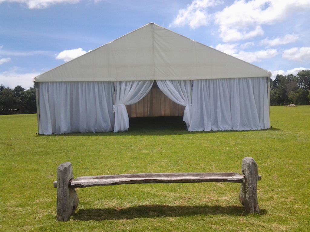 whit marquee - silk curtians - bride shoot