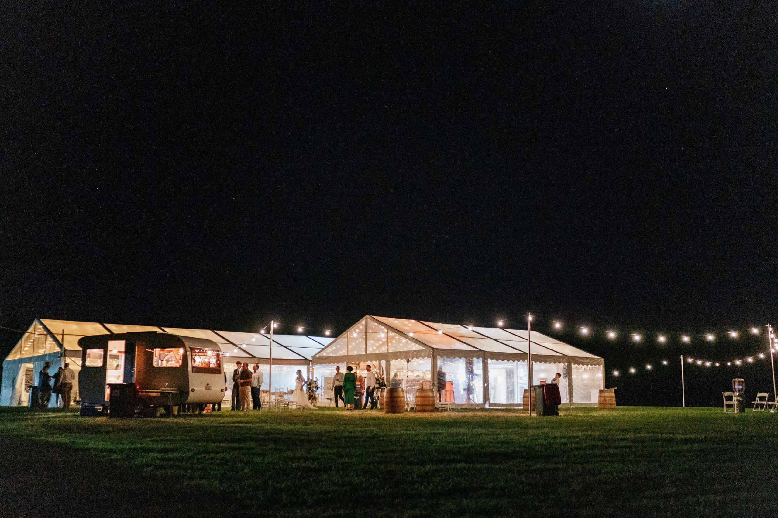 white marquee - weddig - farm - night - festoon - luke middlemass