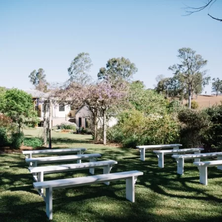 White bench seating (10 available) each 2.2m long